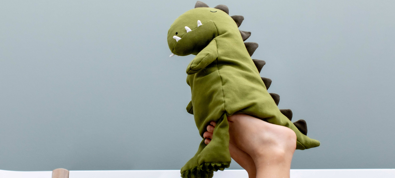 Trixien vauvatuotteet Oran verkkokaupasta. Kuvassa Trixien vihreä dinosaurus. 