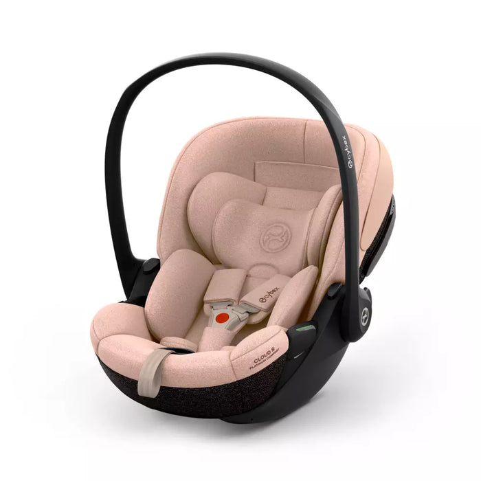 Cybex Cloud S Cozy Beige kuvattuna edestä pienentimen kanssa